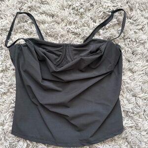 Black tank top with a drape front and built-in bra let
